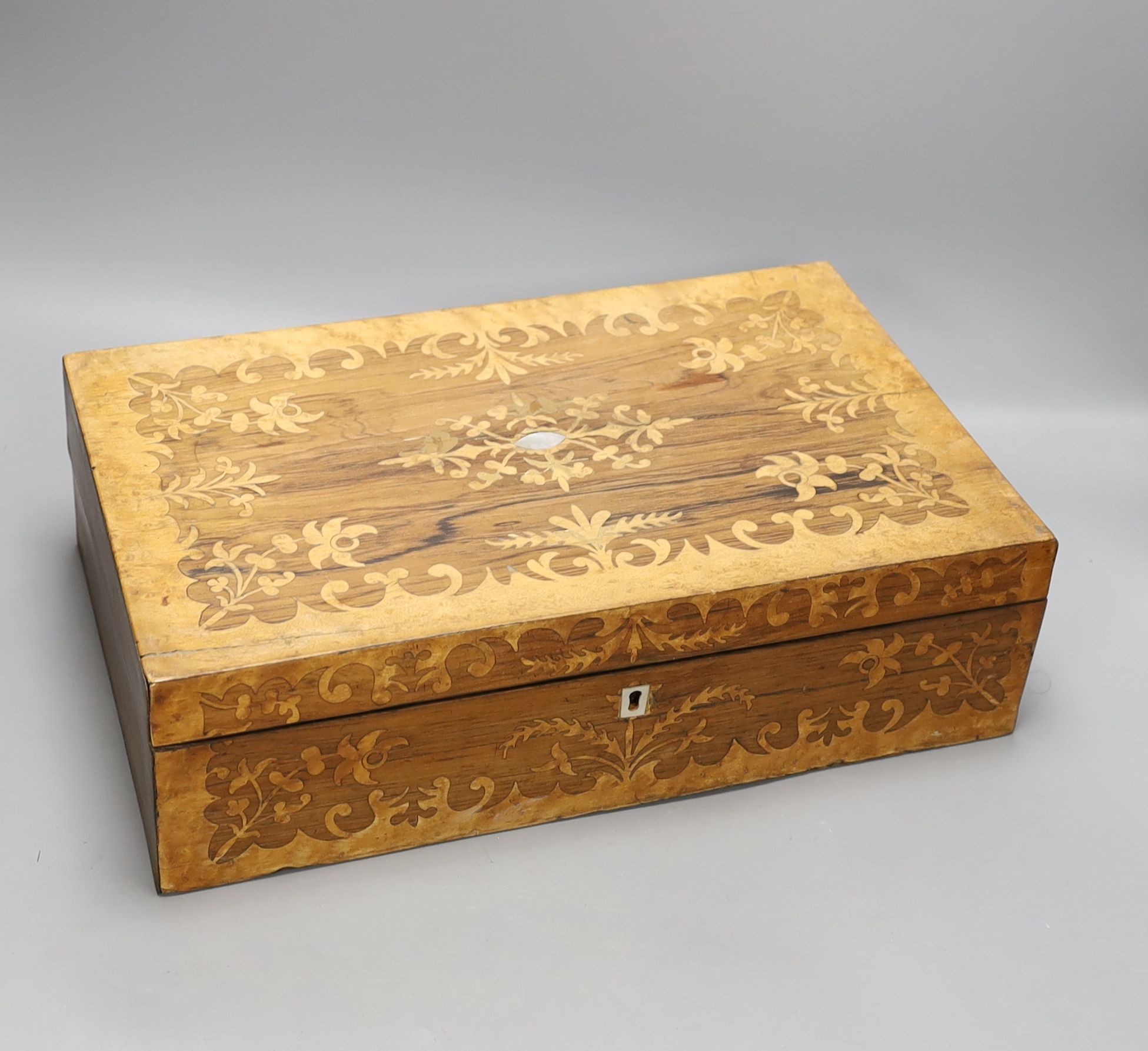 An early 20th century inlaid mahogany lancet shaped mantel clock and a Victorian rosewood and marquetry writing slope, writing slope, 41 cms wide x 12 cms high.